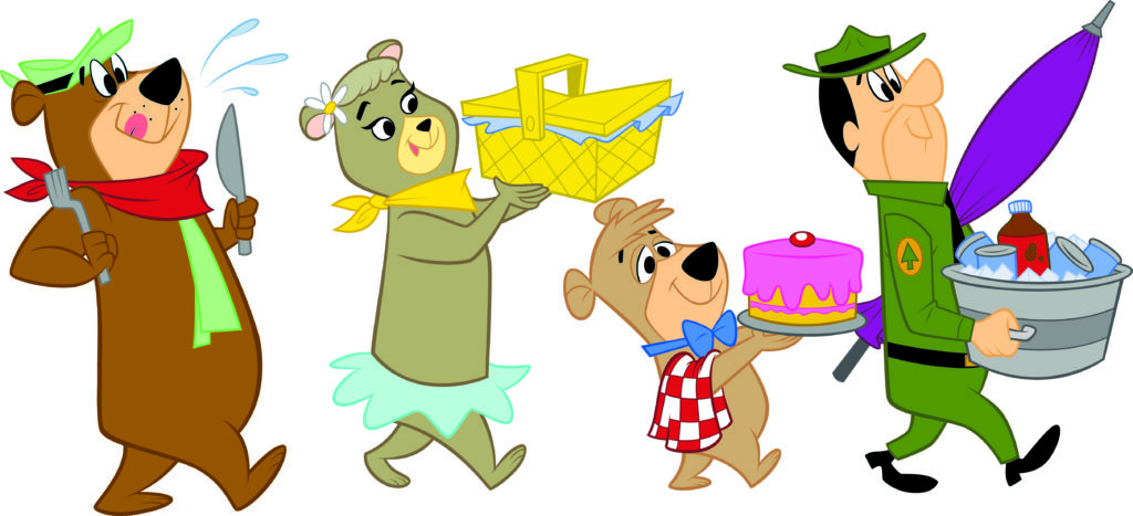 Yogi Bear & Friends walking with picnic items to set up a picnic