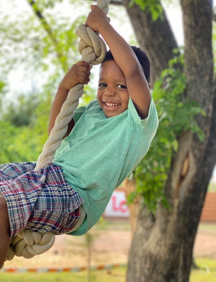 Child on Rope swing