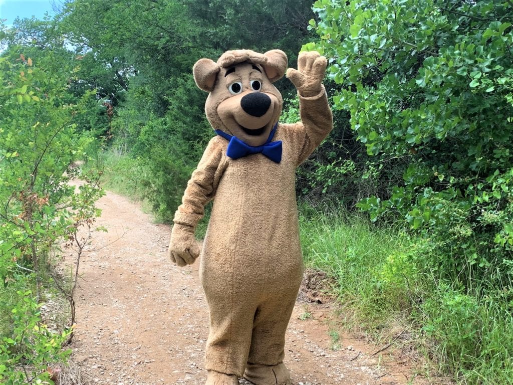 Boo Boo Bear waving from the Nature Trail